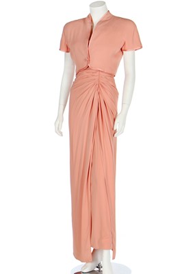 Lot 158 - A Valentino Garavani couture peach silk-crêpe strapless evening gown, 1990s