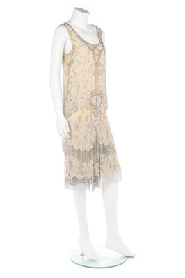 Lot 116 - An ivory chiffon beaded flapper dress,...