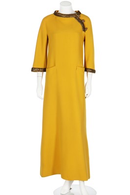 Lot 420 - A Valentino Garavani couture buttercup-yellow wool evening gown, late 1960s