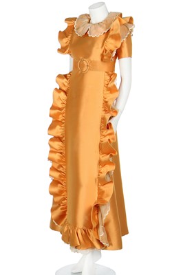 Lot 401 - Maison Lanvin couture by Jules-François Crahay - an apricot ziberline evening gown, circa 1968