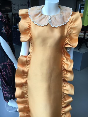 Lot 401 - Maison Lanvin couture by Jules-François Crahay - an apricot ziberline evening gown, circa 1968