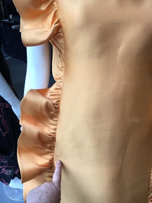 Lot 401 - Maison Lanvin couture by Jules-François Crahay - an apricot ziberline evening gown, circa 1968