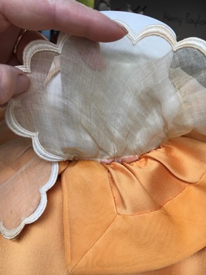 Lot 401 - Maison Lanvin couture by Jules-François Crahay - an apricot ziberline evening gown, circa 1968