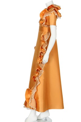 Lot 401 - Maison Lanvin couture by Jules-François Crahay - an apricot ziberline evening gown, circa 1968