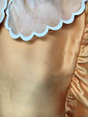 Lot 401 - Maison Lanvin couture by Jules-François Crahay - an apricot ziberline evening gown, circa 1968