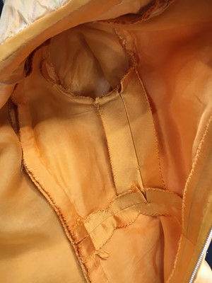 Lot 401 - Maison Lanvin couture by Jules-François Crahay - an apricot ziberline evening gown, circa 1968