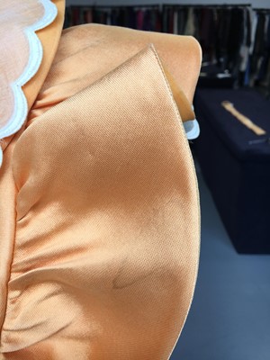 Lot 401 - Maison Lanvin couture by Jules-François Crahay - an apricot ziberline evening gown, circa 1968