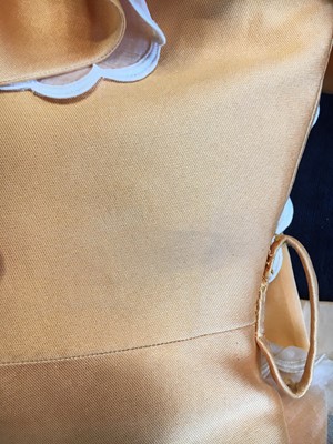 Lot 401 - Maison Lanvin couture by Jules-François Crahay - an apricot ziberline evening gown, circa 1968