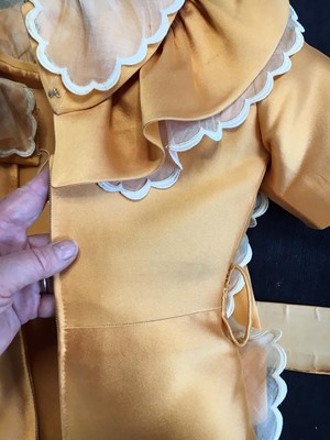 Lot 401 - Maison Lanvin couture by Jules-François Crahay - an apricot ziberline evening gown, circa 1968