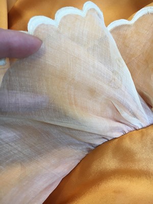 Lot 401 - Maison Lanvin couture by Jules-François Crahay - an apricot ziberline evening gown, circa 1968