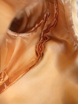 Lot 401 - Maison Lanvin couture by Jules-François Crahay - an apricot ziberline evening gown, circa 1968