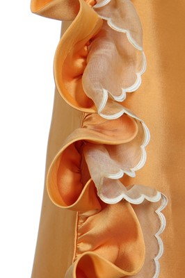 Lot 401 - Maison Lanvin couture by Jules-François Crahay - an apricot ziberline evening gown, circa 1968