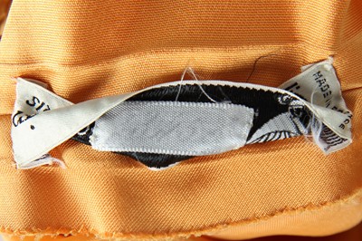 Lot 401 - Maison Lanvin couture by Jules-François Crahay - an apricot ziberline evening gown, circa 1968