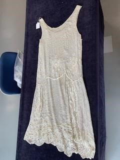 Lot 51 - A beaded white muslin flapper dress, circa 1928