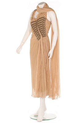 Lot 328 - An Alexander McQueen beige chiffon cocktail...