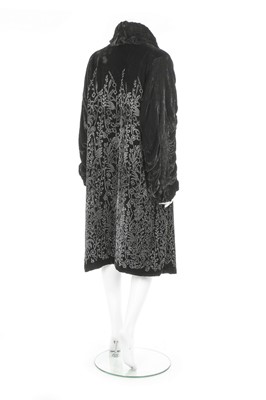 Lot 125 - A Liberty of London black velvet opera coat,...