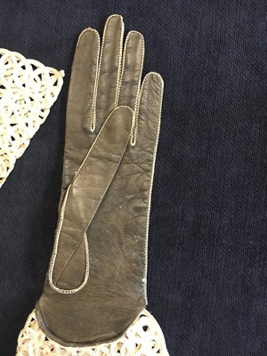 Lot 354 - Two pairs of black mesh gloves, circa 1860