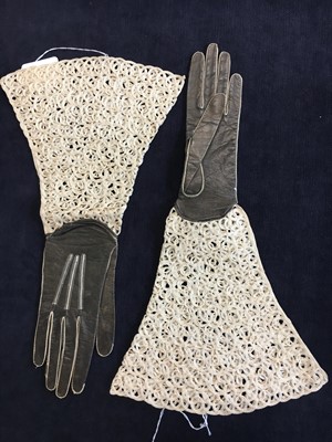 Lot 354 - Two pairs of black mesh gloves, circa 1860