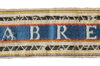 Lot 351 - A pair of unused striped silk garters woven with amorous motto, Spanish, 18th century