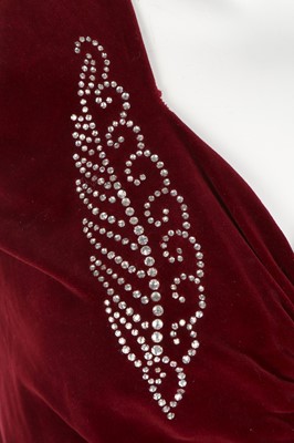 Lot 126 - A Nicole Groult couture bias-cut red velvet...