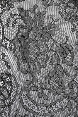Lot 127 - A rare and early Balenciaga couture black lace...