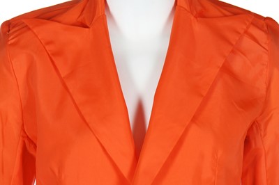 Lot 461 - A rare Alexander McQueen bright orange nylon coat, 'The Hunger' collection, Spring-Summer 1996