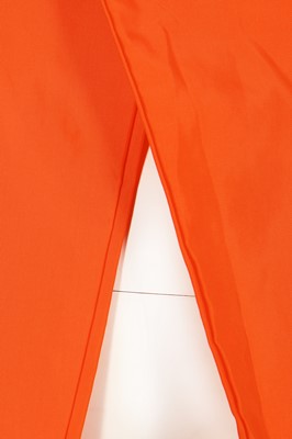 Lot 461 - A rare Alexander McQueen bright orange nylon coat, 'The Hunger' collection, Spring-Summer 1996