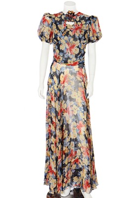 Lot 65 - A good floral printed chiffon garden party gown, 1930s