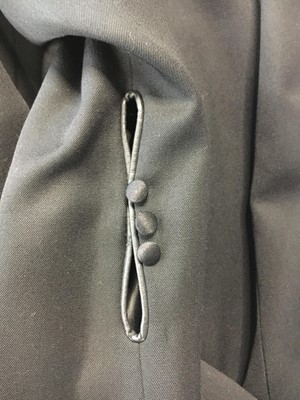 Lot 440 - A John Galliano black wool suit, 'Dolores' collection, Autumn-Winter 1995-96