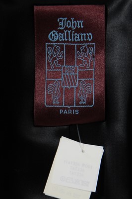 Lot 440 - A John Galliano black wool suit, 'Dolores' collection, Autumn-Winter 1995-96