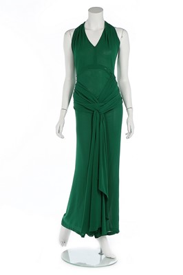 Lot 132 - An emerald green crpe romaine evening gown,...