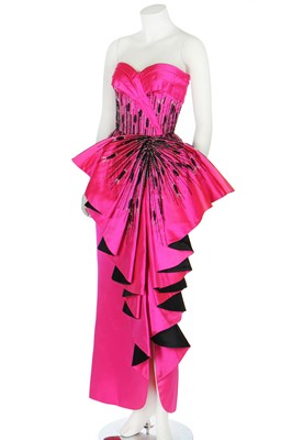 Lot 179 - A bespoke Darnell shocking-pink and black satin evening gown, 1983
