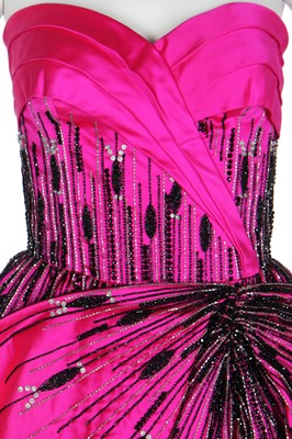 Lot 179 - A bespoke Darnell shocking-pink and black satin evening gown, 1983