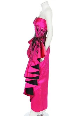 Lot 179 - A bespoke Darnell shocking-pink and black satin evening gown, 1983