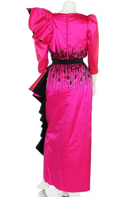 Lot 179 - A bespoke Darnell shocking-pink and black satin evening gown, 1983