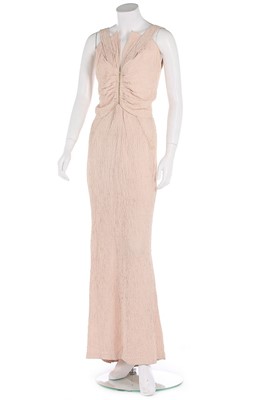 Lot 133 - A Lucien Lelong cloque pink crêpe evening gown,...