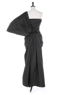 Lot 136 - A Balenciaga couture black silk taffeta...