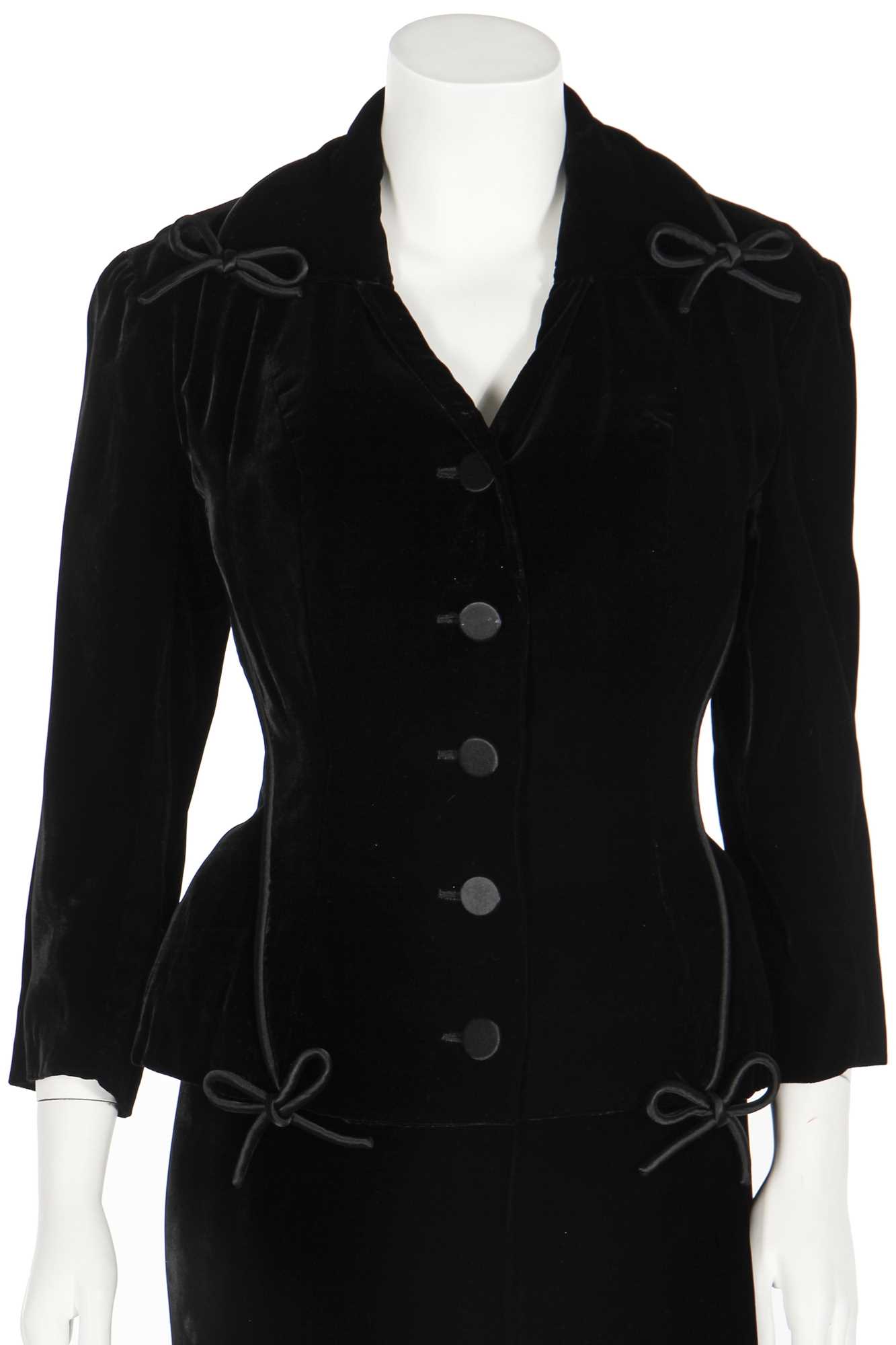 Lot 90 - A Balmain black silk-velvet suit, 1956