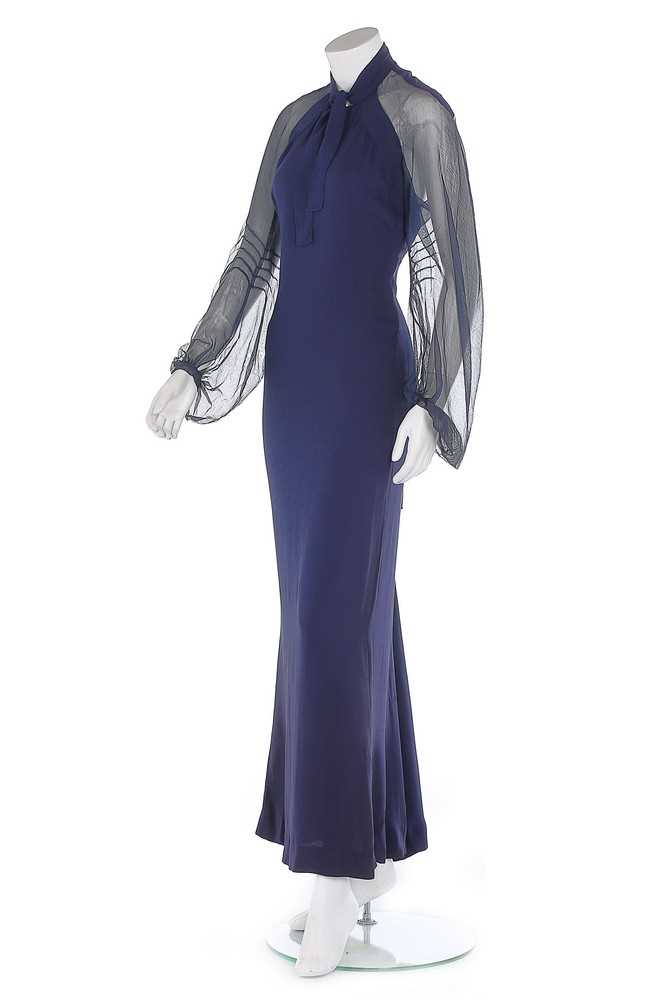 Lot 137 - A Germaine Monteil bias-cut navy crêpe evening...