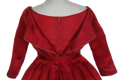 Lot 379 - A Christian Dior by Yves Saint Laurent haute couture red satin cocktail dress, Autumn-Winter 1959