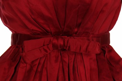 Lot 379 - A Christian Dior by Yves Saint Laurent haute couture red satin cocktail dress, Autumn-Winter 1959