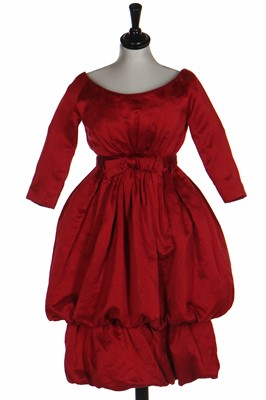 Lot 379A - A Christian Dior by Yves Saint Laurent haute couture red satin cocktail dress, Autumn-Winter 1959