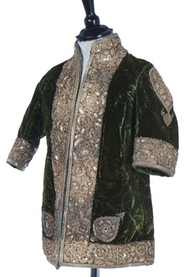 Lot 280 - A boy's embroidered olive-green velvet court coat, Indian, late 19th century