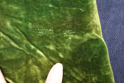 Lot 280 - A boy's embroidered olive-green velvet court coat, Indian, late 19th century