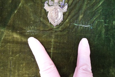 Lot 280 - A boy's embroidered olive-green velvet court coat, Indian, late 19th century