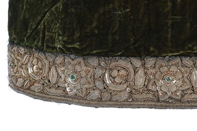 Lot 280 - A boy's embroidered olive-green velvet court coat, Indian, late 19th century