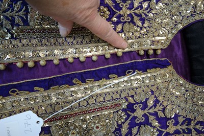 Lot 276 - A boy's elaborately embroidered and bejewelled purple satin waistcoat, Indian, late 19th century
