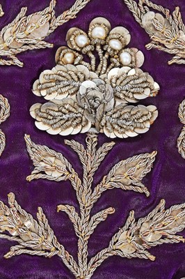 Lot 276 - A boy's elaborately embroidered and bejewelled purple satin waistcoat, Indian, late 19th century