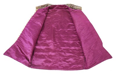 Lot 276 - A boy's elaborately embroidered and bejewelled purple satin waistcoat, Indian, late 19th century