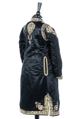 Lot 287 - A young man's black satin coat, Indian, circa 1910